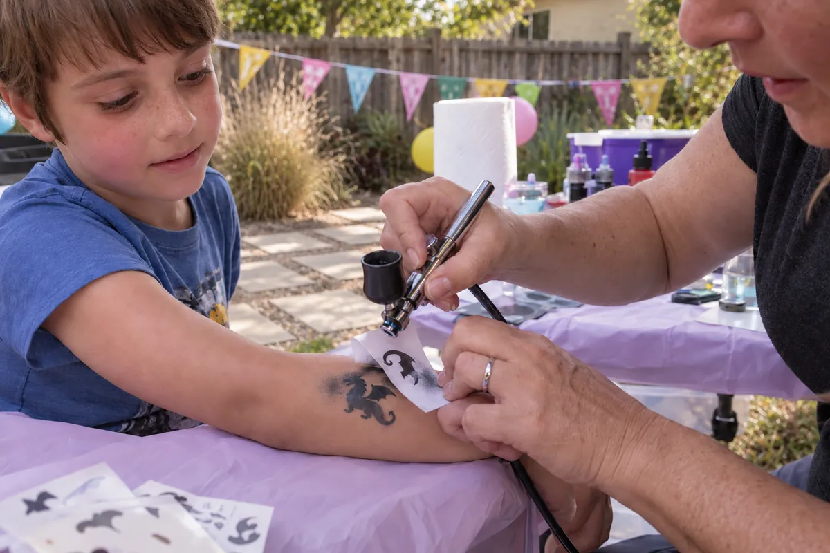 Airbrush tattoo station at an LA kids party