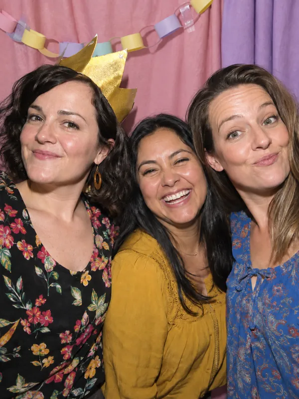 Girlfriends in a party crown at a Los Angeles photobooth