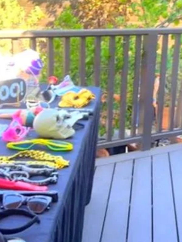 LA photobooth prop table set up on a patio in Los Angeles